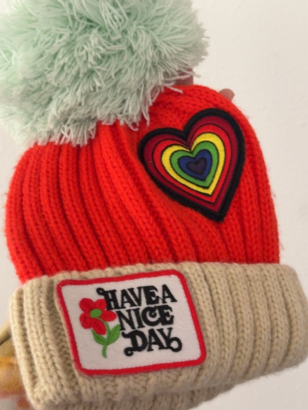 Free People Pom Pom Beanie Hat with Rainbow Heart - red/pink & Cream
